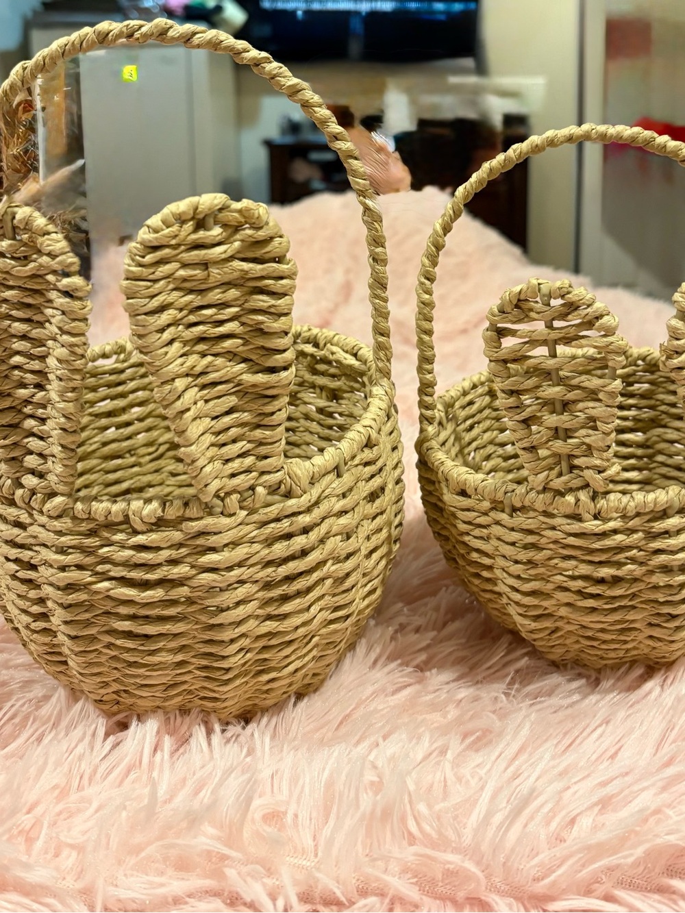 Homemade woven wicker and rattan bunny ear baskets.